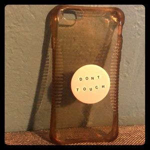 Clear phone case with pink pop socket